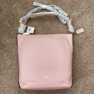 Coach blossom and gold shoulder or crossbody purse. Brand new.